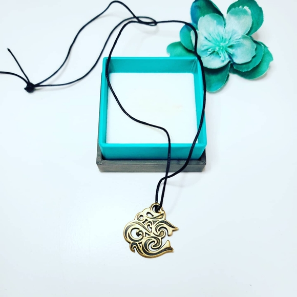 Sacred "Om" symbol pendant with a cord - Picture 3 of 3